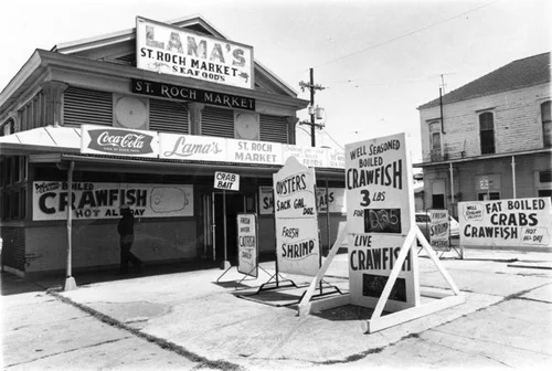 Lama's St. Roch Market Seafoods in the 1970s, with hand-painted crawfish and oyster signs