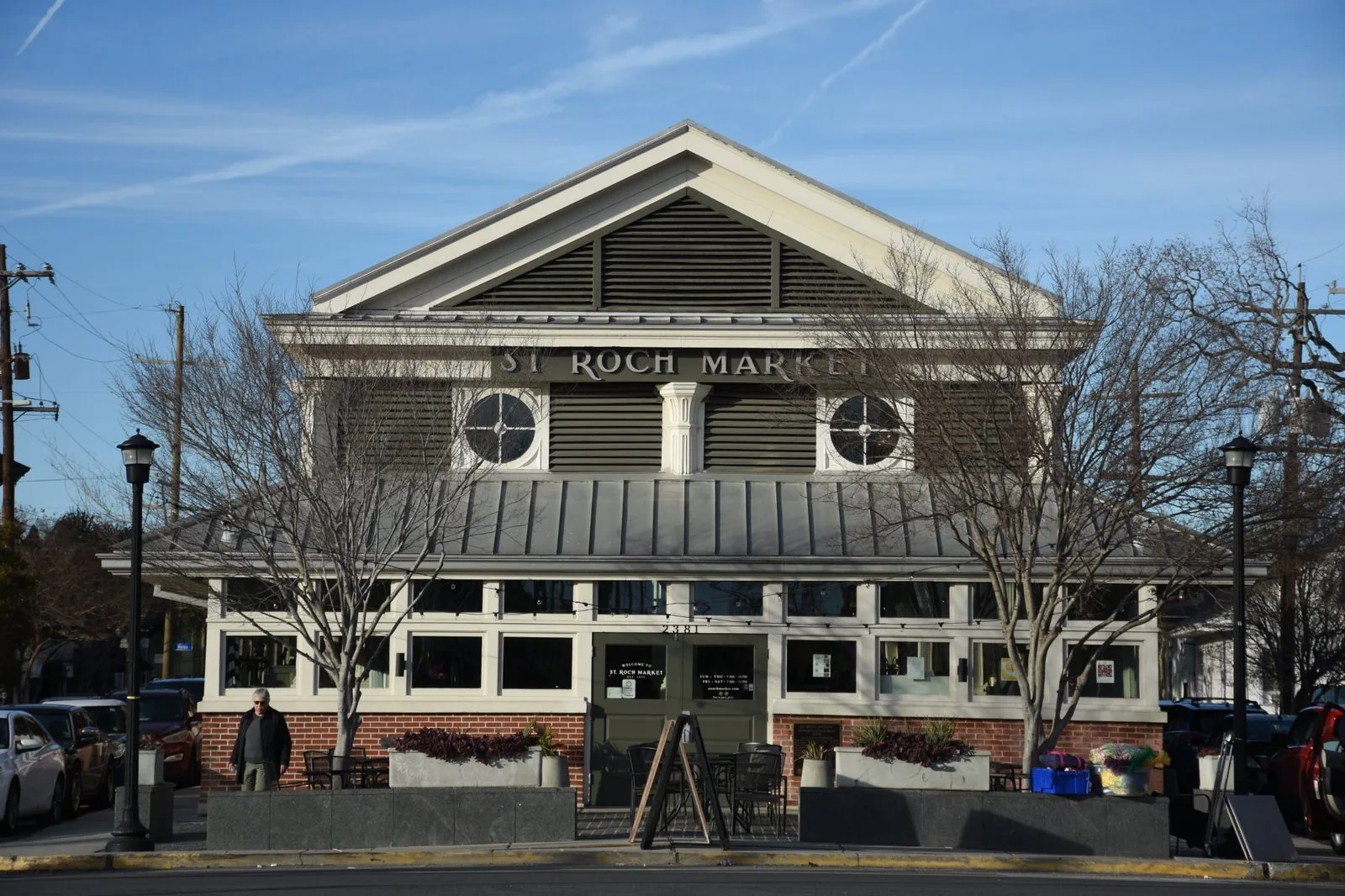 St. Roch Market New Orleans today at 2381 St. Claude Ave, the beautifully restored 1875 food hall with white columns and outdoor seating