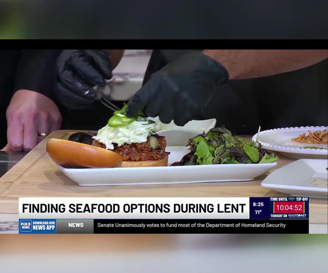 Barbecue jackfruit sandwich from FRSH Juice and Food Company at St. Roch Market being assembled live on FOX 8 Morning Show with Finding Seafood Options During Lent chyron