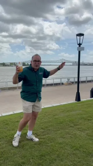 Kevin Pedeaux at the new Woldenberg Riverfront Park with the Crescent City Connection bridge in the background
