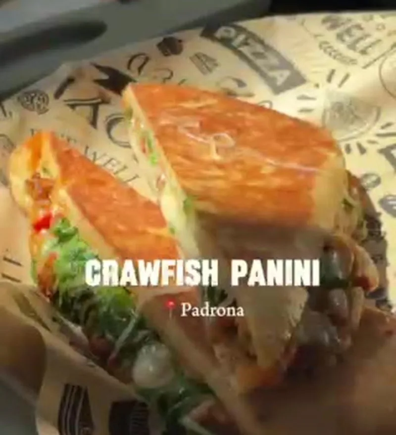 Crawfish Panini from Padrona at St. Roch Market, pressed Italian bread stuffed with crawfish tails, cheese, and peppers