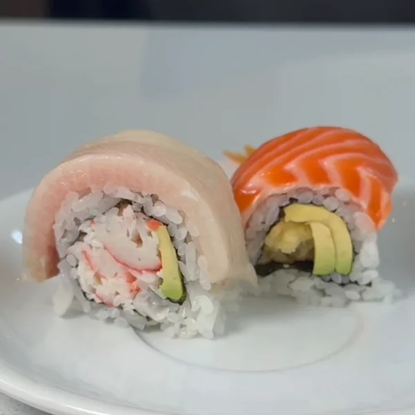 Two specialty rolls at Lin's Poke & Sushi, one topped with yellowtail and one with salmon